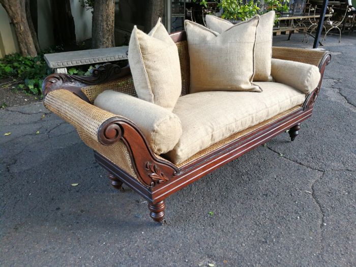 An Antique Victorian Carved Mahogany and Rattan Settee On Castors with Hessian Cushions and Bolsters - Image 5