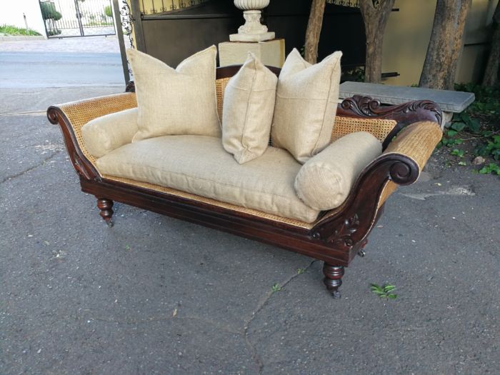 An Antique Victorian Carved Mahogany and Rattan Settee On Castors with Hessian Cushions and Bolsters - Image 6