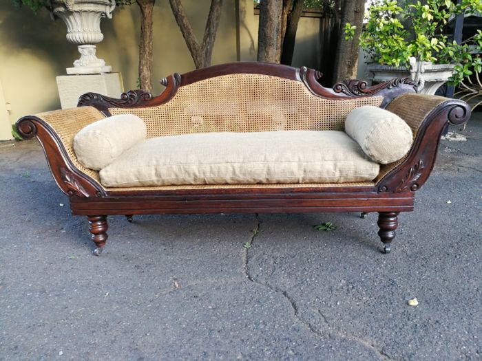An Antique Victorian Carved Mahogany and Rattan Settee On Castors with Hessian Cushions and Bolsters - Image 7
