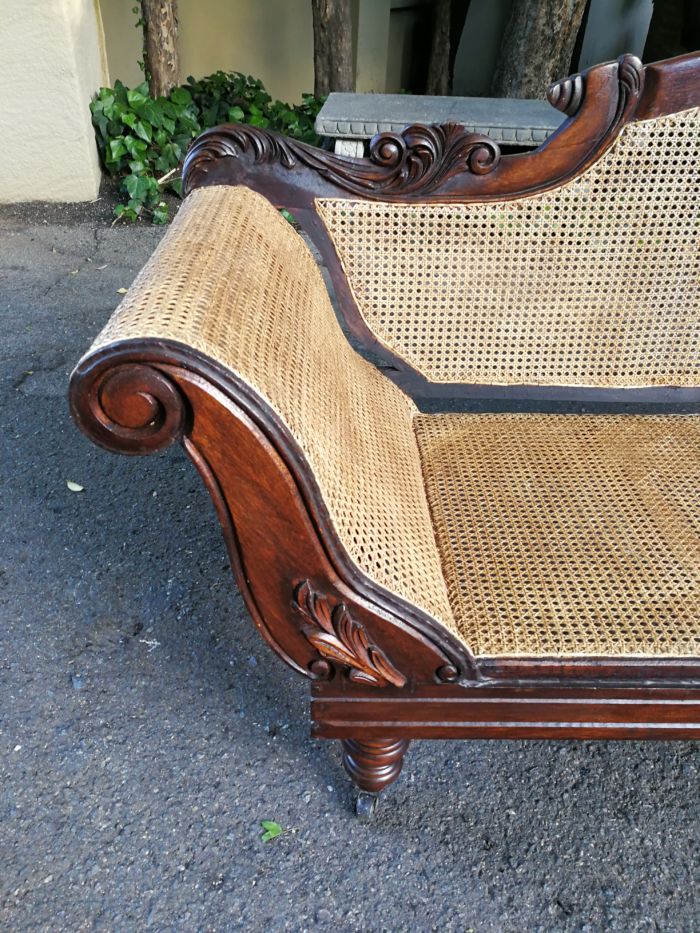 An Antique Victorian Carved Mahogany and Rattan Settee On Castors with Hessian Cushions and Bolsters - Image 12