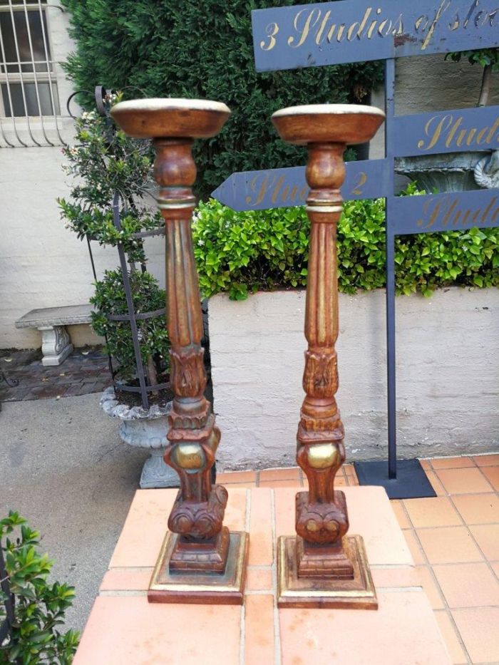 A Pair Of Gilded Wooden Candle Holders