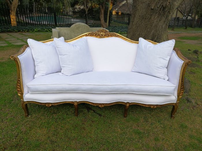 A French Louis XVl Style Gilded Settee Upholstered in a White Linen with Three Scatter Cushions - Image 3