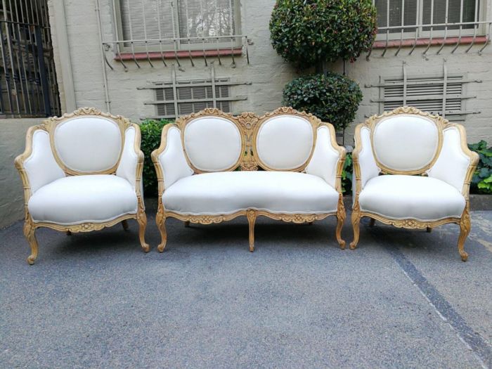 A French 20th Century Bleached / Stripped / Natural Walnut Bergére Settee and Pair of Armchairs