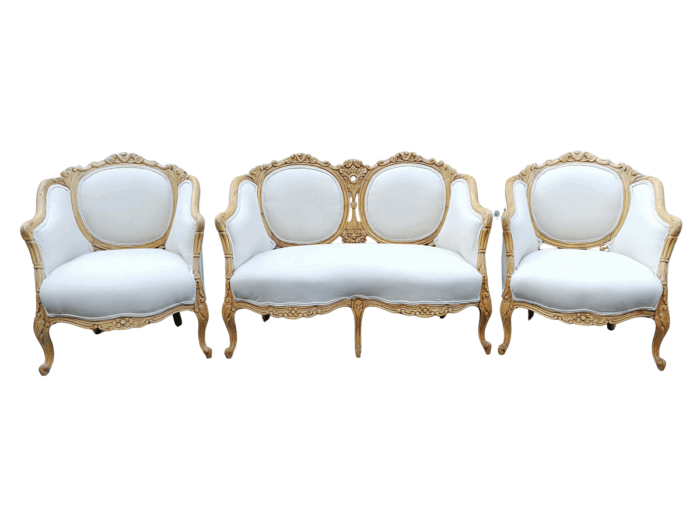 A French 20th Century Bleached / Stripped / Natural Walnut Bergére Settee and Pair of Armchairs
