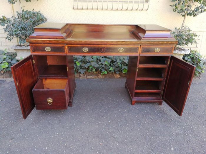 A Late Regency Inlaid Mahogany and Rosewood Pedestal Sideboard, fitted with original oval foliate brass escutcheons and loop handles and with a cellarette drawer - Image 6