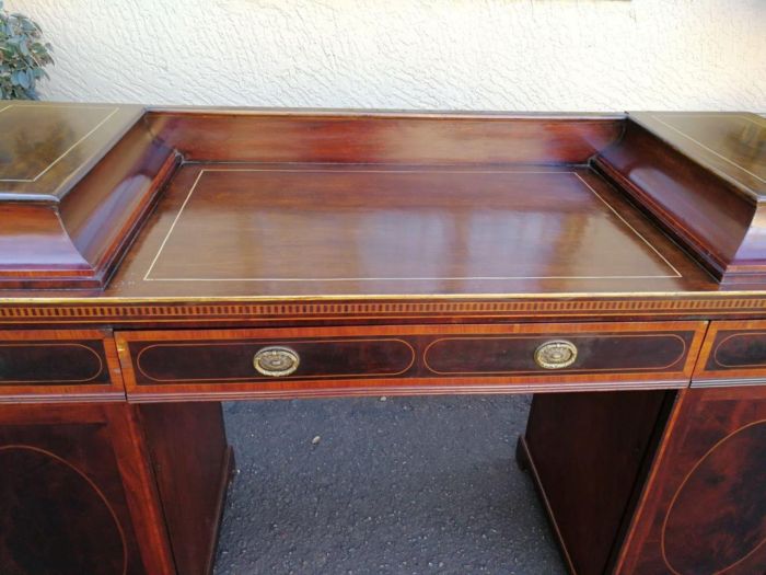 A Late Regency Inlaid Mahogany and Rosewood Pedestal Sideboard, fitted with original oval foliate brass escutcheons and loop handles and with a cellarette drawer - Image 9