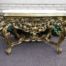 A Walnut Wood Carved Table Hand Gilded with 22Karat Gold Leaf