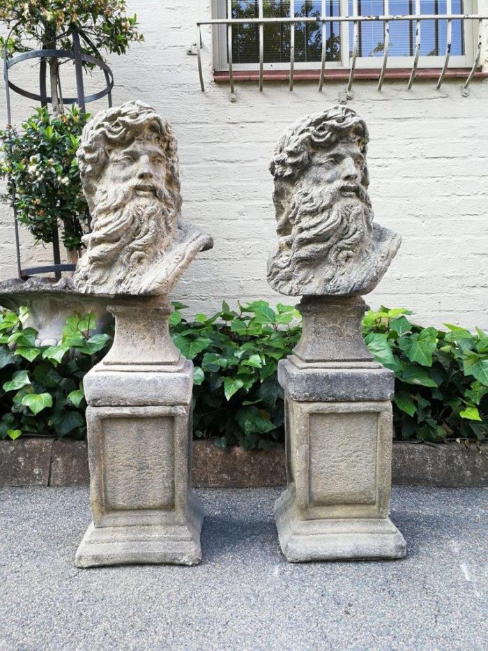 A Pair of 20th Century English Cast Stone/Concrete Busts  of Zeus on plinths ( Zeus is the god of the sky in ancient Greek mythology)