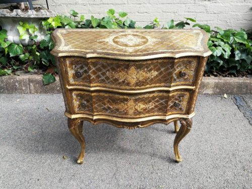 A Gilt-Wood Chest of Drawers