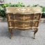 A Gilt-Wood Chest of Drawers