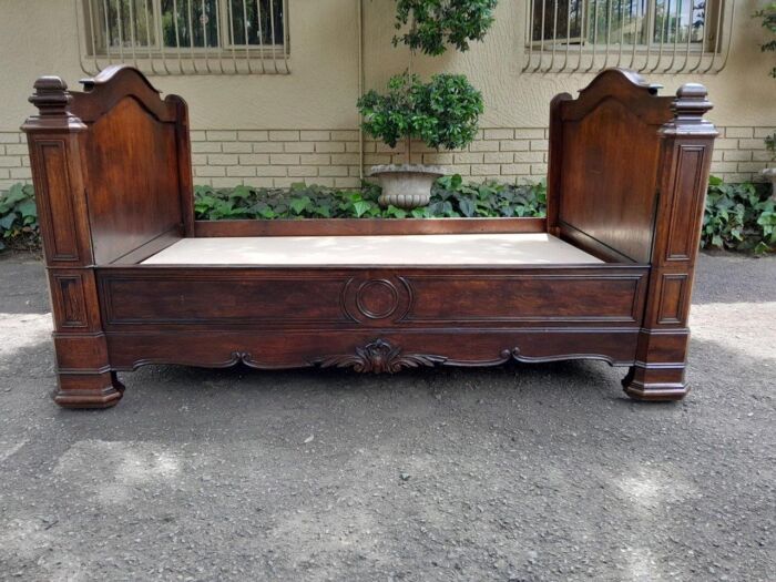 A French Mahogany Lit Bateau Daybed/Bed.  Dimensions: 112cm high