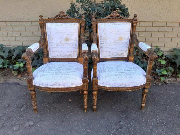 A Pair of 20th Century French Style Carved and Hand Gilded Armchairs Upholstered in a Custom and Handmade Gold Script Linen for The Crown Collection - Image 2