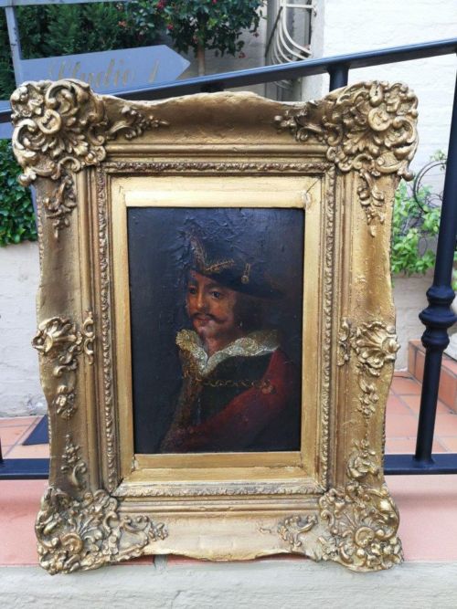 An Antique Oil on Board in an Antique Carved and Gilded Frame