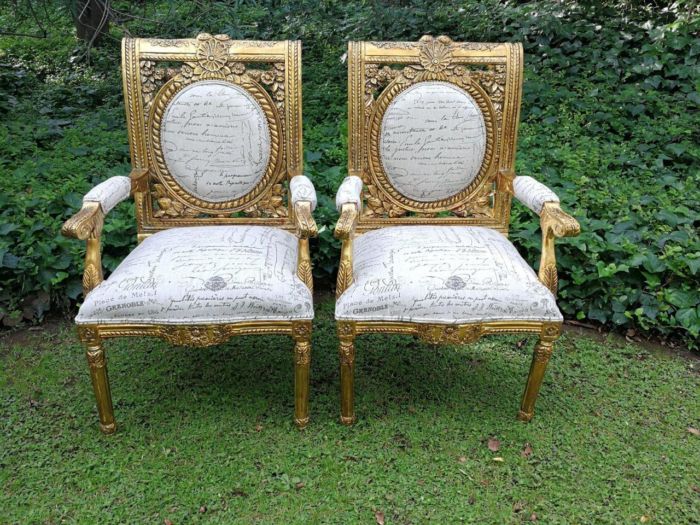A 20TH Century Pair Of Ornately Carved And Hand Gilded French Style Armchairs Upholstered in a Custom-made for The Crown Collection Script Design Linen ND - Image 2