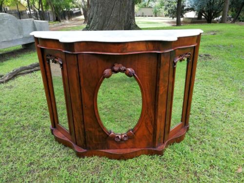 A Victorian Burr Walnut Credenza With Mirror Panels And Cream Marble Top