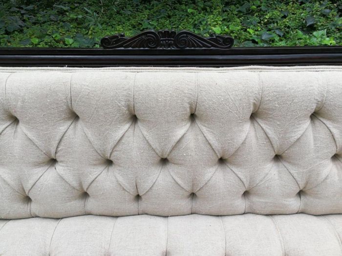 A 20TH Century English Rosewood Settee On Castors and Upholstered in an Imported Linen with Deep Button Detail and Bolster Cushions - Image 6