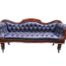 An Antique 19th Century Walnut Settee On Castors Upholstered In A Deep Buttoned Leather