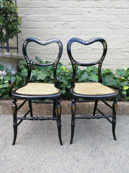 A Pair Of Lacquered Mother Of Pearl Inlaid Chairs