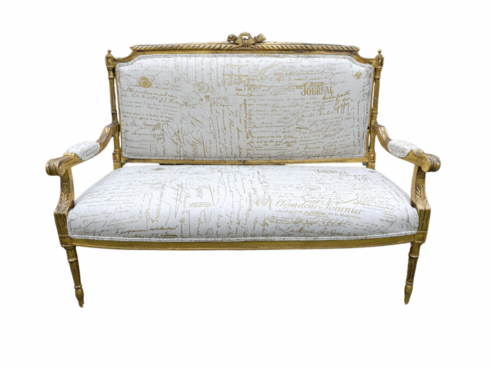 A French Style Hand-Gilded Beechwood Settee Upholstered In A Custom-Made Handmade Linen With Script Design