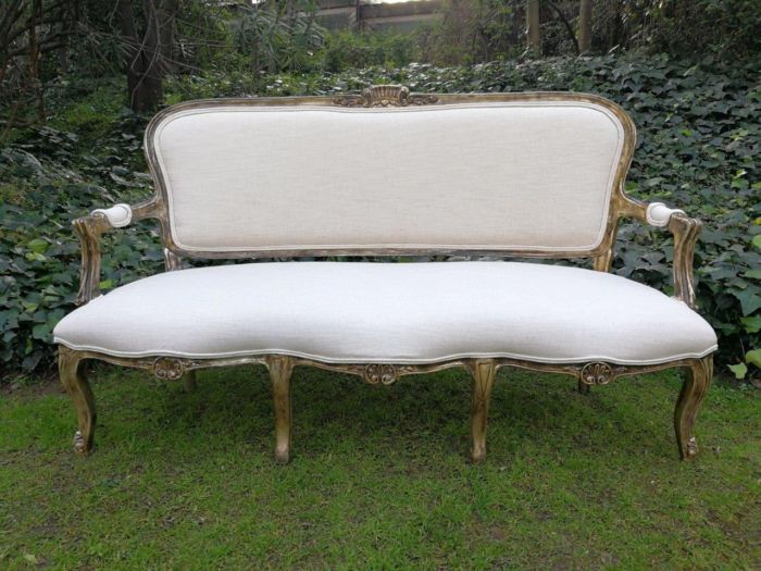 A 20th Century Carved And Hand-Gilded French Style Settee Upholstered In An Imported Linen - Image 3