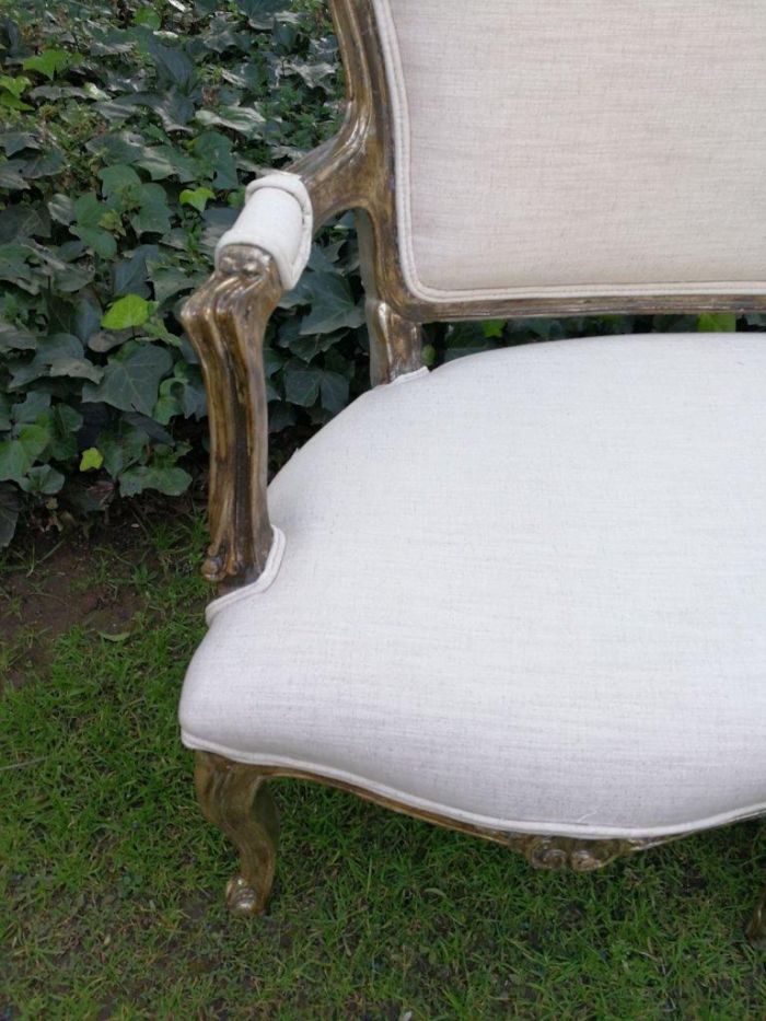 A 20th Century Carved And Hand-Gilded French Style Settee Upholstered In An Imported Linen - Image 5