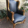 A 20th Century Pair Of French Style Carved And Gilded Armchairs in Leather - Image 6