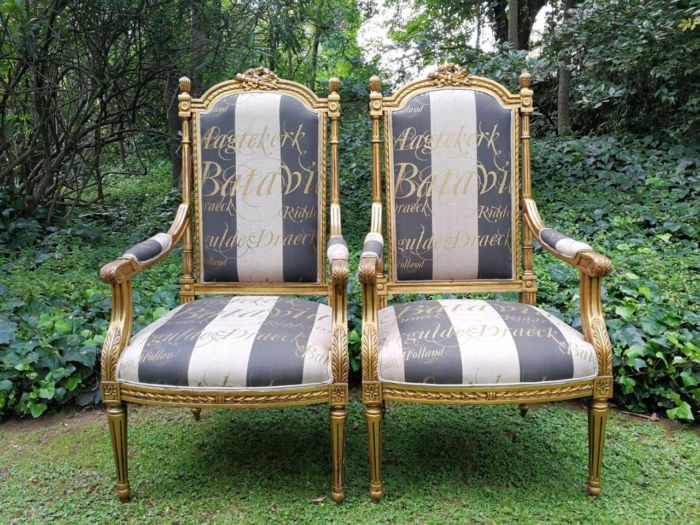 A Pair of French Style Armchairs Imported from Canonbury Antiques in England and Upholstered in a Handmade Linen with Gold Script
