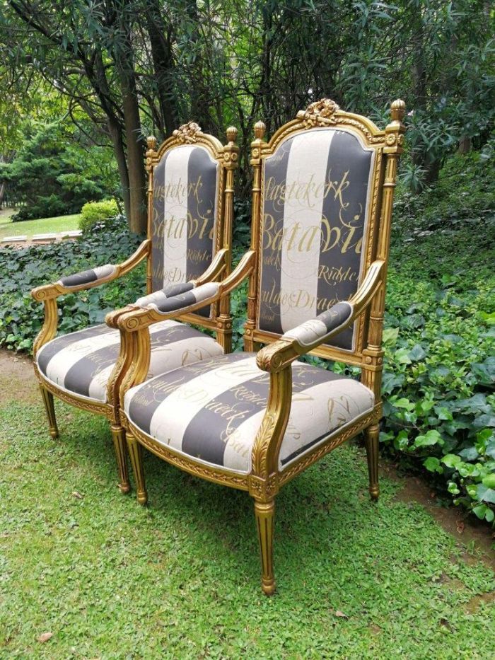 A Pair of French Style Armchairs Imported from Canonbury Antiques in England and Upholstered in a Handmade Linen with Gold Script - Image 4