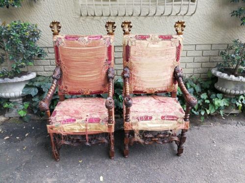 A Pair Of 19th Century Gilt-Wood And Oak Carved Throne Chairs