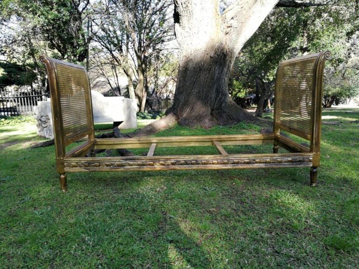 A 20th Century French Style Rattan and Wood Daybed Circa 1920s