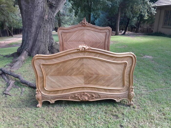 A 19th Century Circa 1880 Ornately Carved and Inlaid Marquetry Bed in a Contemporary Bleached Finish - Image 3