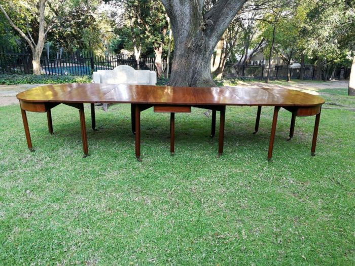 A 19TH Century Circa 1810George III Mahogany Extension Dining Table with Brass Castors