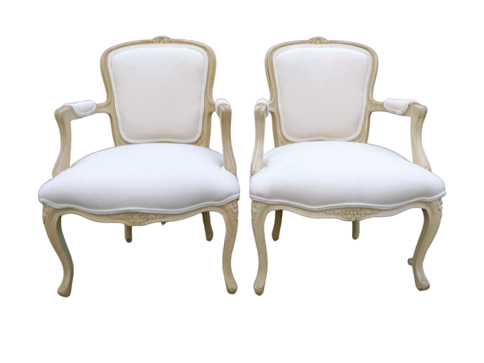 A Pair of 20th Century French Rococo Style Oak Armchairs in a bleached / natural finish