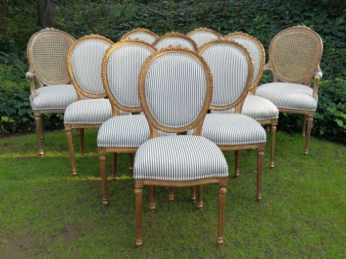 A 20th Century French Style Imported Set Of Twelve Gilded Dining Chairs Comprising: Two Carvers  /  Armchairs With Rattan Backs And Ten Dining Chairs - Image 3