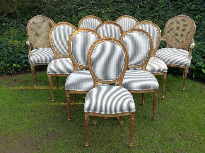 A 20th Century French Style Imported Set Of Twelve Gilded Dining Chairs Comprising: Two Carvers  /  Armchairs With Rattan Backs And Ten Dining Chairs - Image 4