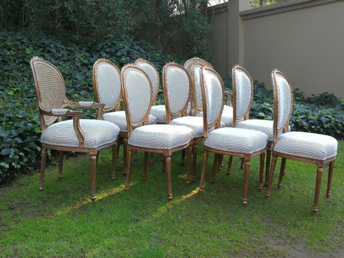 A 20th Century French Style Imported Set Of Twelve Gilded Dining Chairs Comprising: Two Carvers  /  Armchairs With Rattan Backs And Ten Dining Chairs - Image 5
