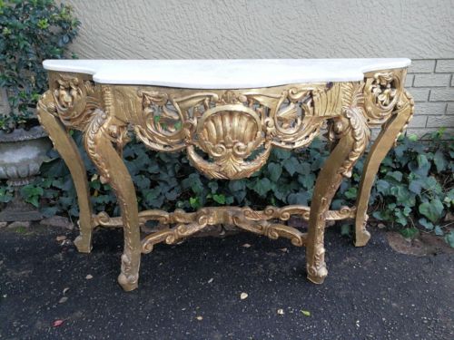 A French Rococo Style Ornately Carved Marble top Console Table