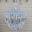 A French Style Brass and Crystal Plate Chandelier with Floral top