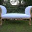A French Style Carved Giltwood Ottoman/Settee