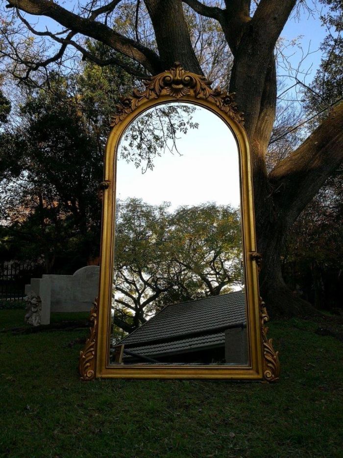 A French Style Ornately Carved Arched and Gilded Bevelled Mirror - Image 2