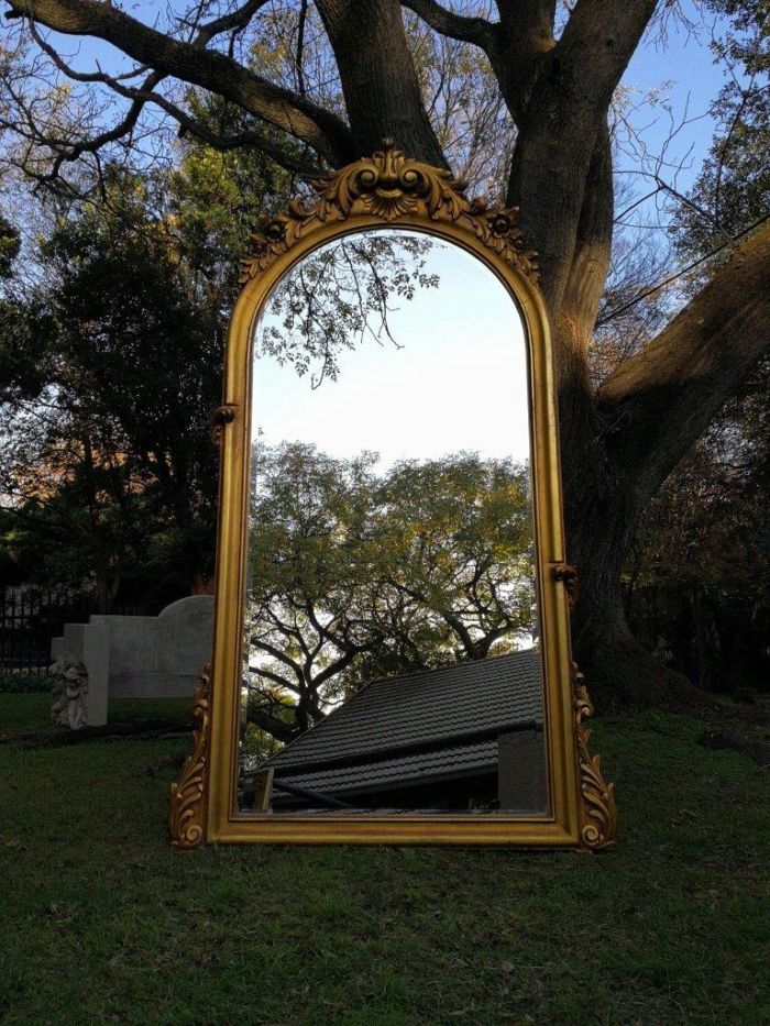A French Style Ornately Carved Arched and Gilded Bevelled Mirror - Image 3