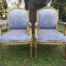 A Pair of French Style Giltwood Ornate Arm Chairs on Fluted legs 