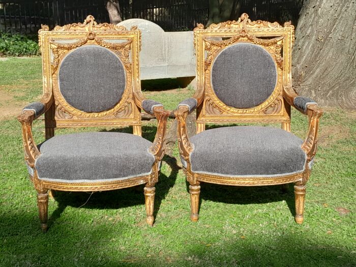 A 20th Century French Style Ornately Carved and Gilded Pair of Arm Chairs - Image 3