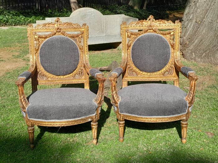 A 20th Century French Style Ornately Carved and Gilded Pair of Arm Chairs - Image 4