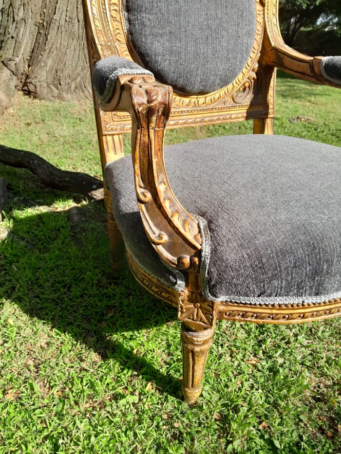A 20th Century French Style Ornately Carved and Gilded Pair of Arm Chairs - Image 10