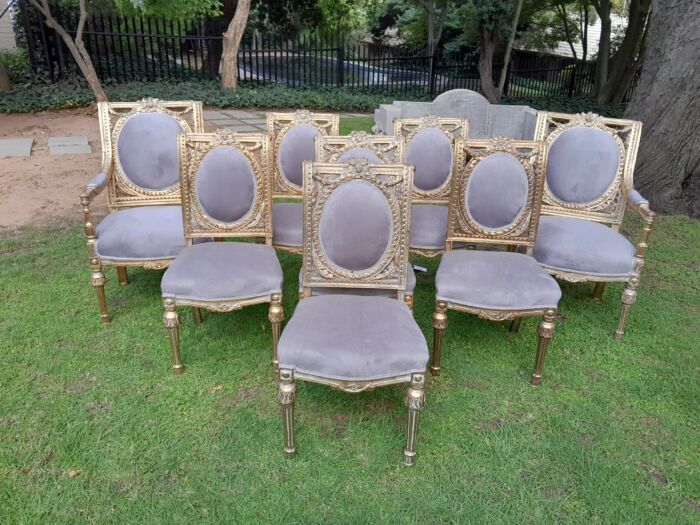 A Set of Eight French Style Ornately Carved and Gilded Dining Chairs (6 chairs and 2 Carvers) - Image 3