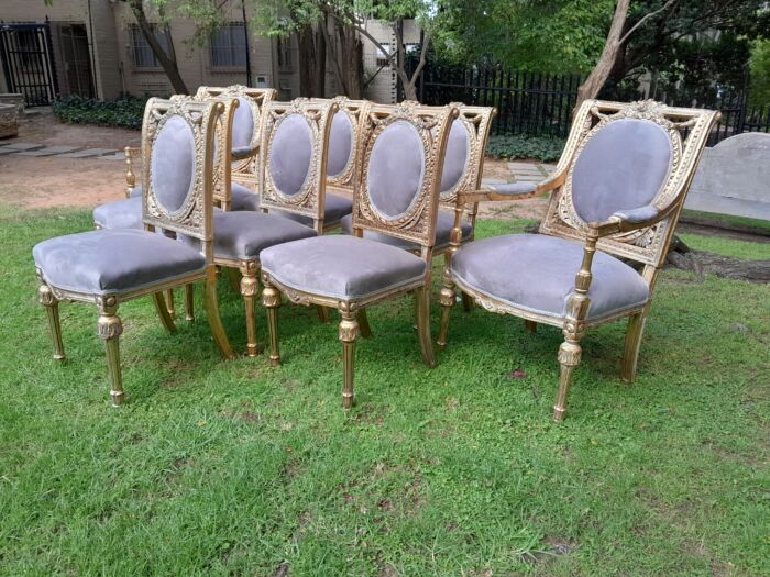 A Set of Eight French Style Ornately Carved and Gilded Dining Chairs (6 chairs and 2 Carvers) - Image 4