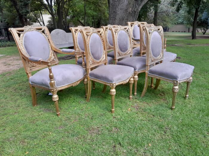 A Set of Eight French Style Ornately Carved and Gilded Dining Chairs (6 chairs and 2 Carvers) - Image 5