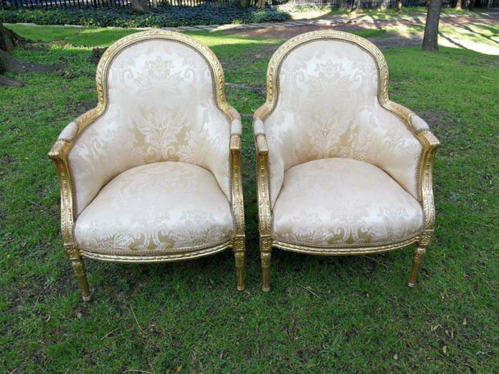 A Pair of French Louis XVI  Style Ornately Carved and Gilded Armchairs - Image 2