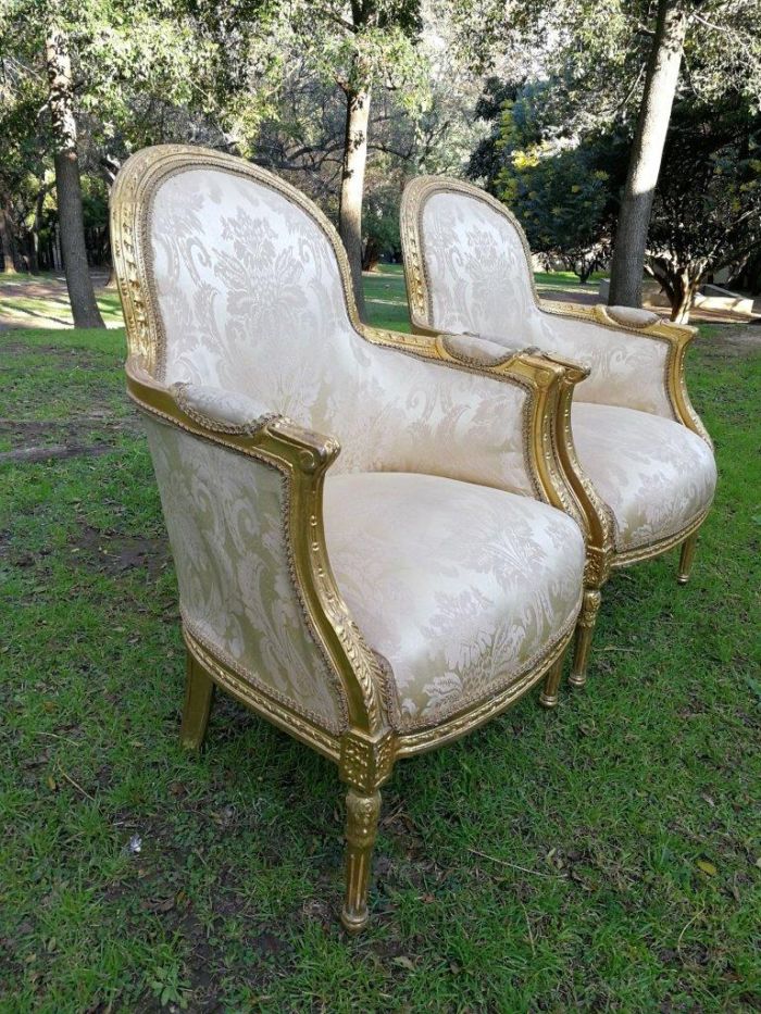 A Pair of French Louis XVI  Style Ornately Carved and Gilded Armchairs - Image 4